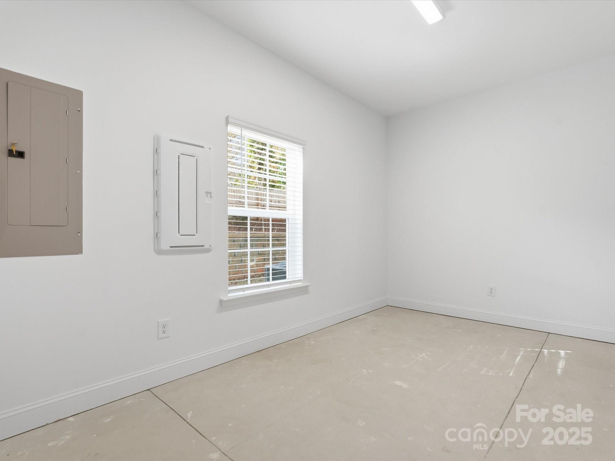3132 Butler Hl Drive Matthews, NC 28105 - Photo 33 of 36 an empty room with a window