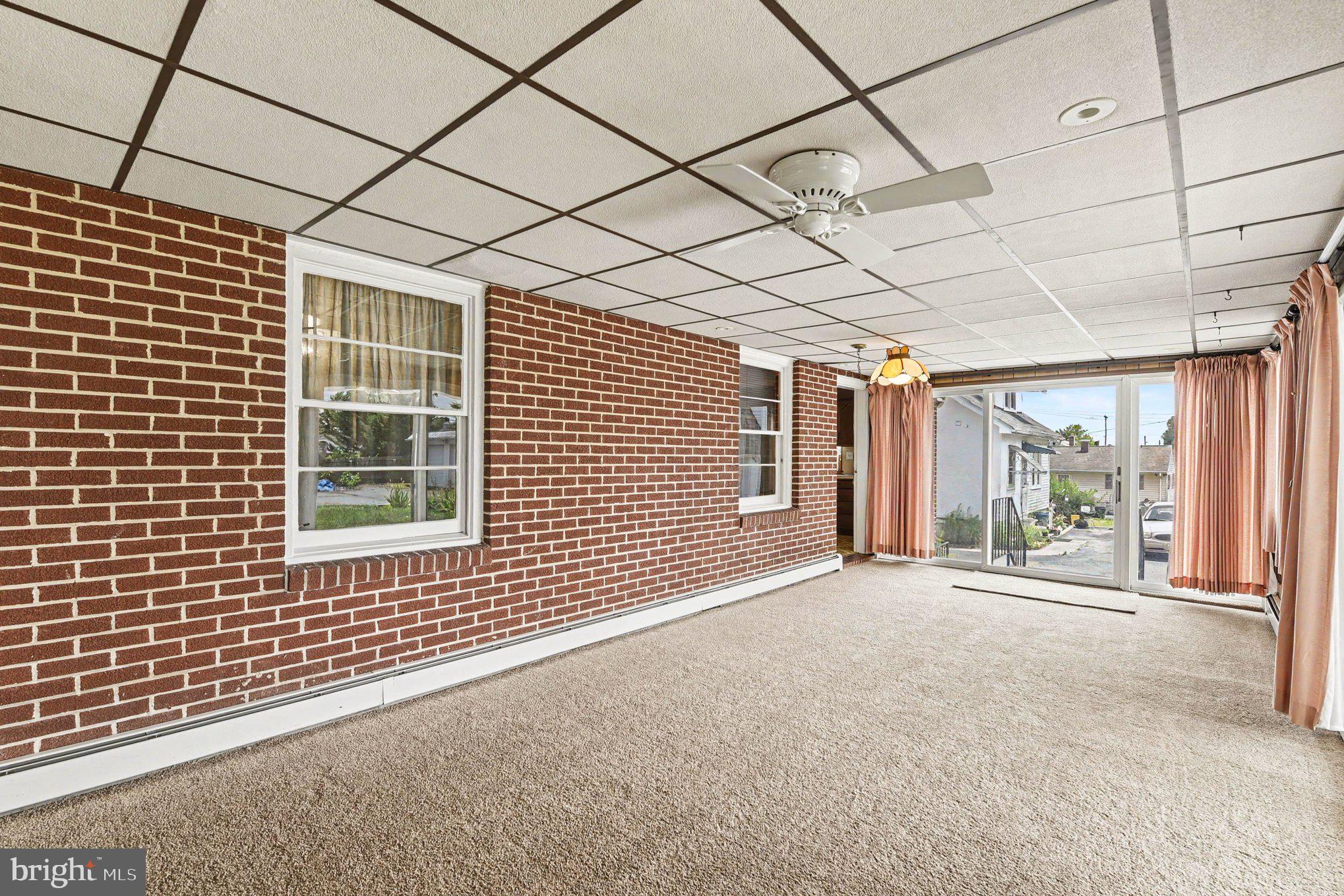 4125 Cliffvale Road Nottingham, MD 21236 - Photo 12 of 24 Bright and airy sunroom retreat.