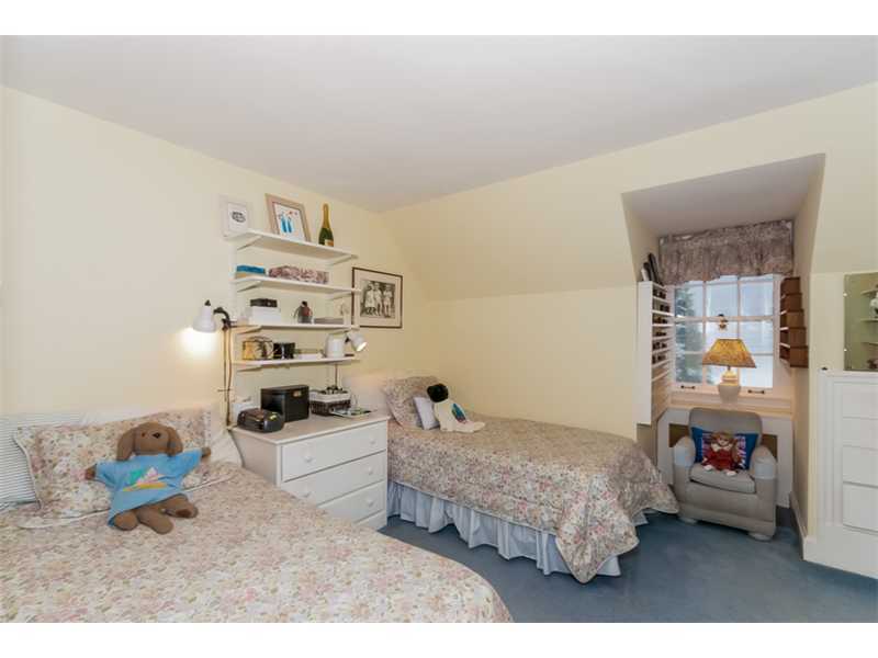 22 Maplewood Drive Darien, CT 06820 - Photo 13 of 25 a bedroom with a bed and a wooden floor