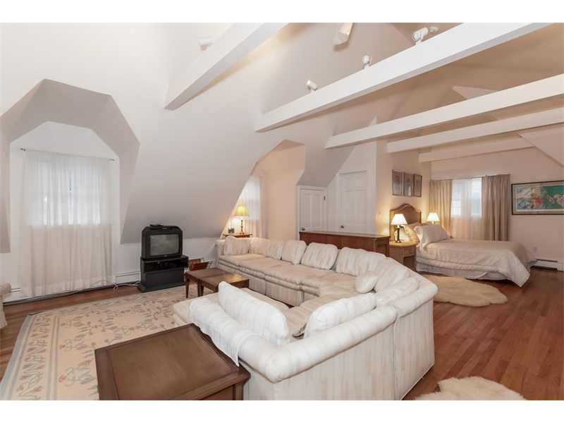 22 Maplewood Drive Darien, CT 06820 - Photo 16 of 25 a living room with furniture and a wooden floor