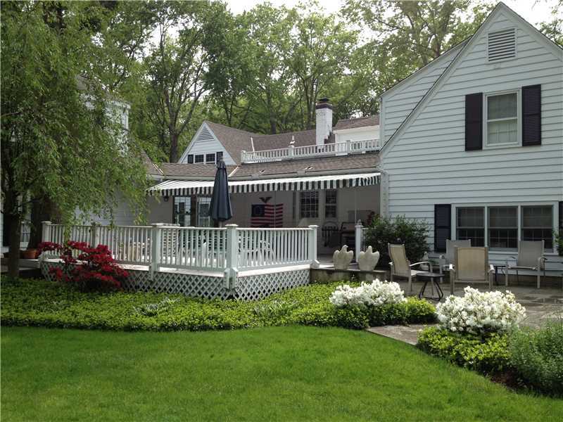 22 Maplewood Drive Darien, CT 06820 - Photo 18 of 25 a view of a house with a yard and sitting area