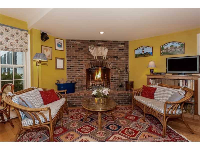 22 Maplewood Drive Darien, CT 06820 - Photo 8 of 25 a outdoor living space with furniture and a flat screen tv