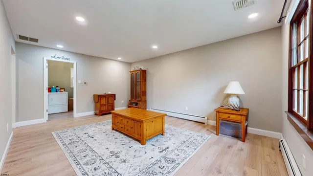 a room with furniture and a wooden floor