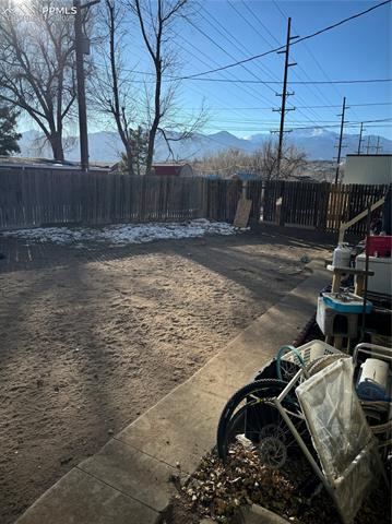 39 Sunflower Road, Unit A Colorado Springs, CO 80907 - Photo 15 of 23 View of yard featuring a mountain view