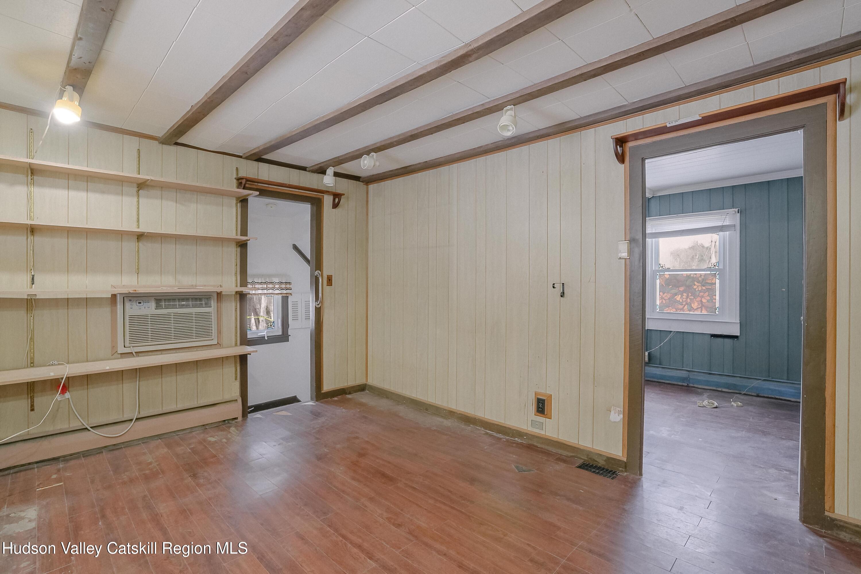 89 Cottekill Road Cottekill, NY 12419 - Photo 17 of 29 a view of empty room with wooden floor and cabinet