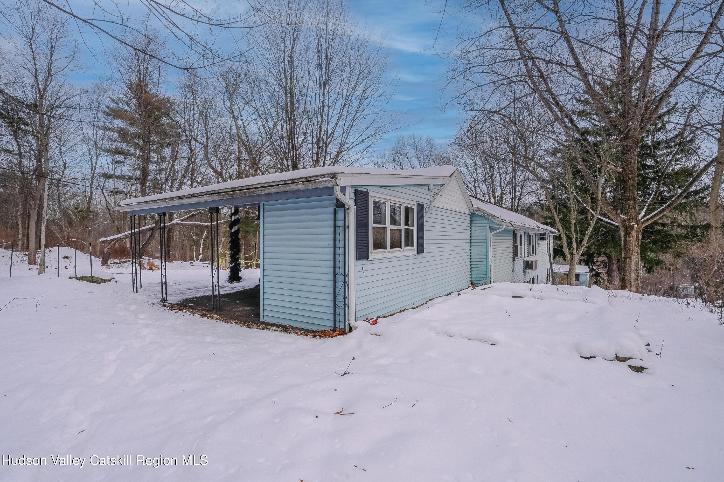 89 Cottekill Road Cottekill, NY 12419 - Photo 23 of 29 a view of a house with a snow in the yard