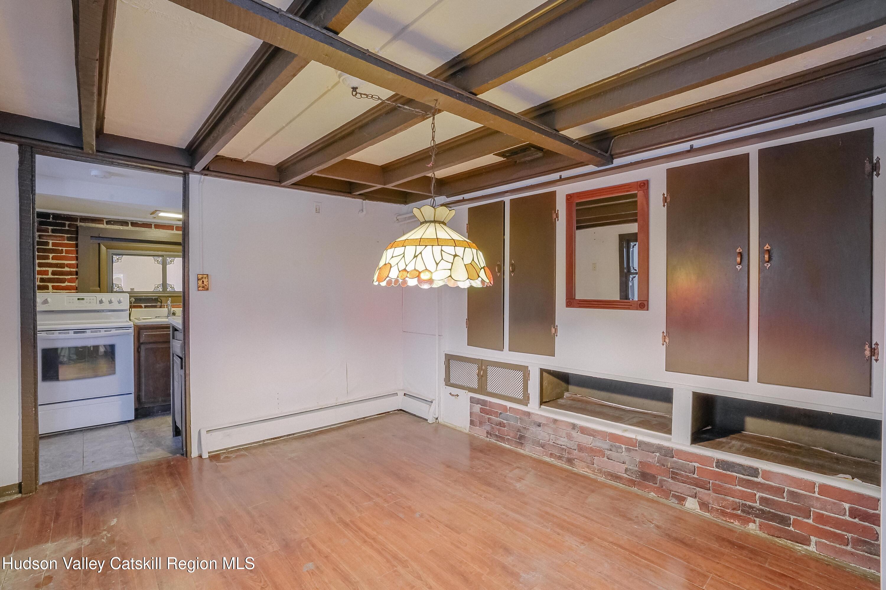 89 Cottekill Road Cottekill, NY 12419 - Photo 6 of 29 a view of a hallway with entryway and chandelier