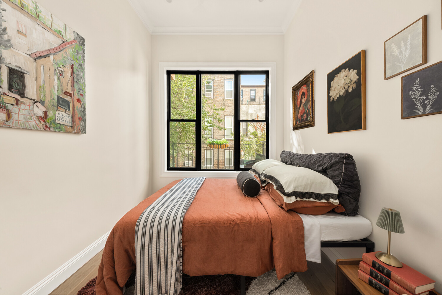 378 8th Street, Unit 3 Brooklyn, NY 11215 - Photo 3 of 15 a bedroom with a bed and a window