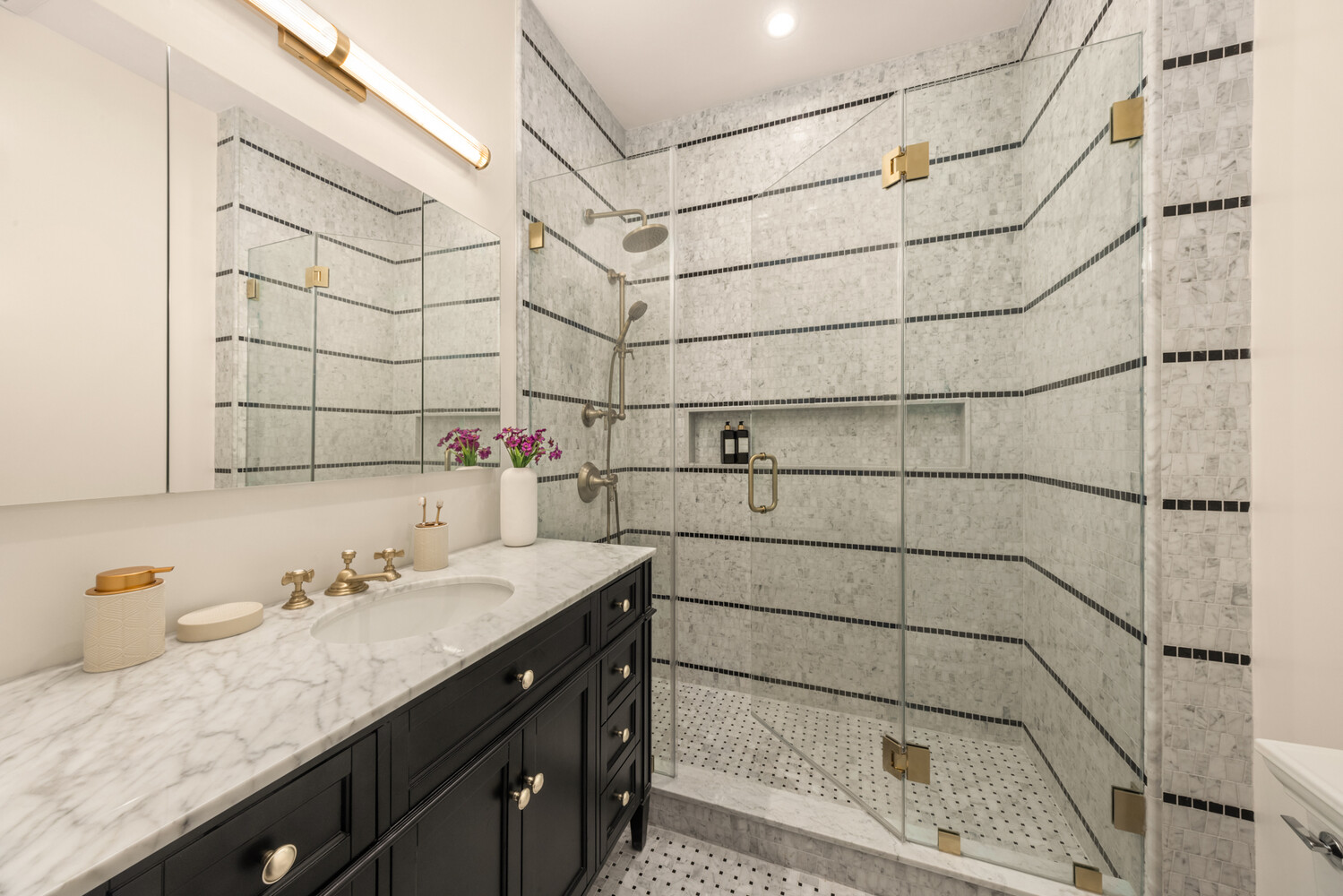 378 8th Street, Unit 3 Brooklyn, NY 11215 - Photo 6 of 15 a bathroom with a sink and a shower