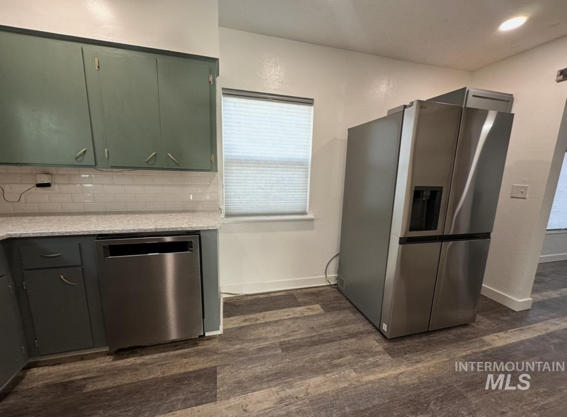 1503 10th Avenue Lewiston, ID 83501 - Photo 20 of 48 View of kitchen with a counter that could fit in between end of counter and fridge. New dishwasher in 2023.