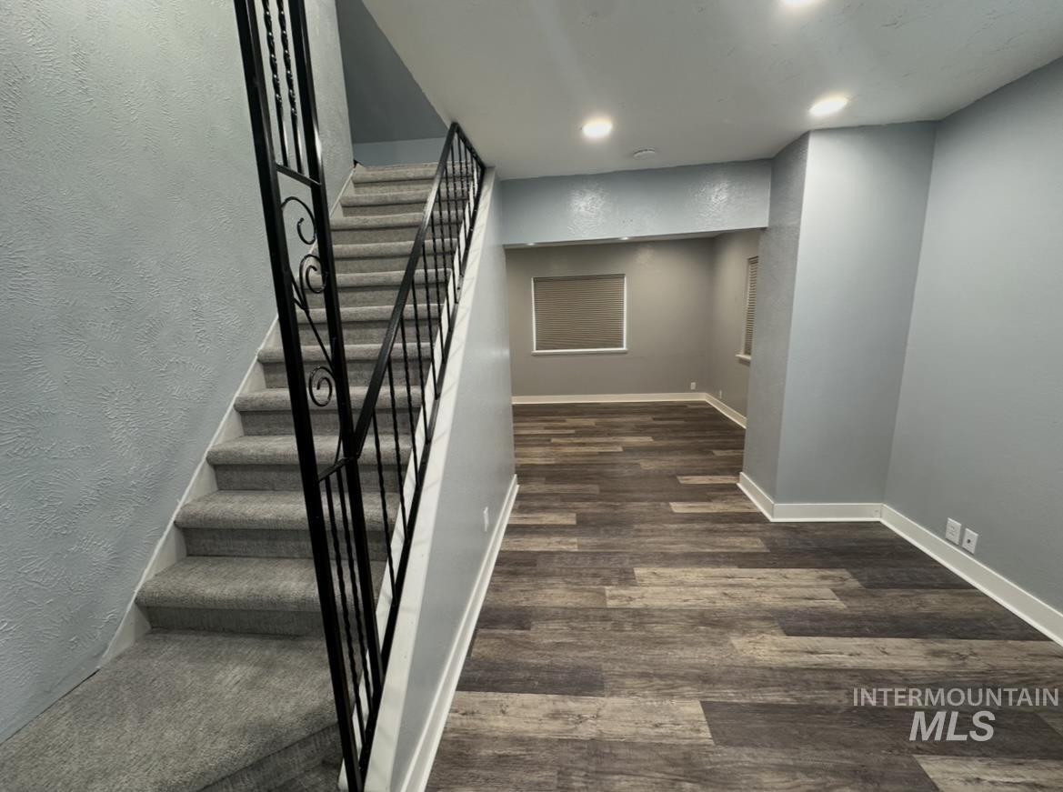 1503 10th Avenue Lewiston, ID 83501 - Photo 30 of 50 Dining room or multiple use space. Stairs lead to attic bedroom.