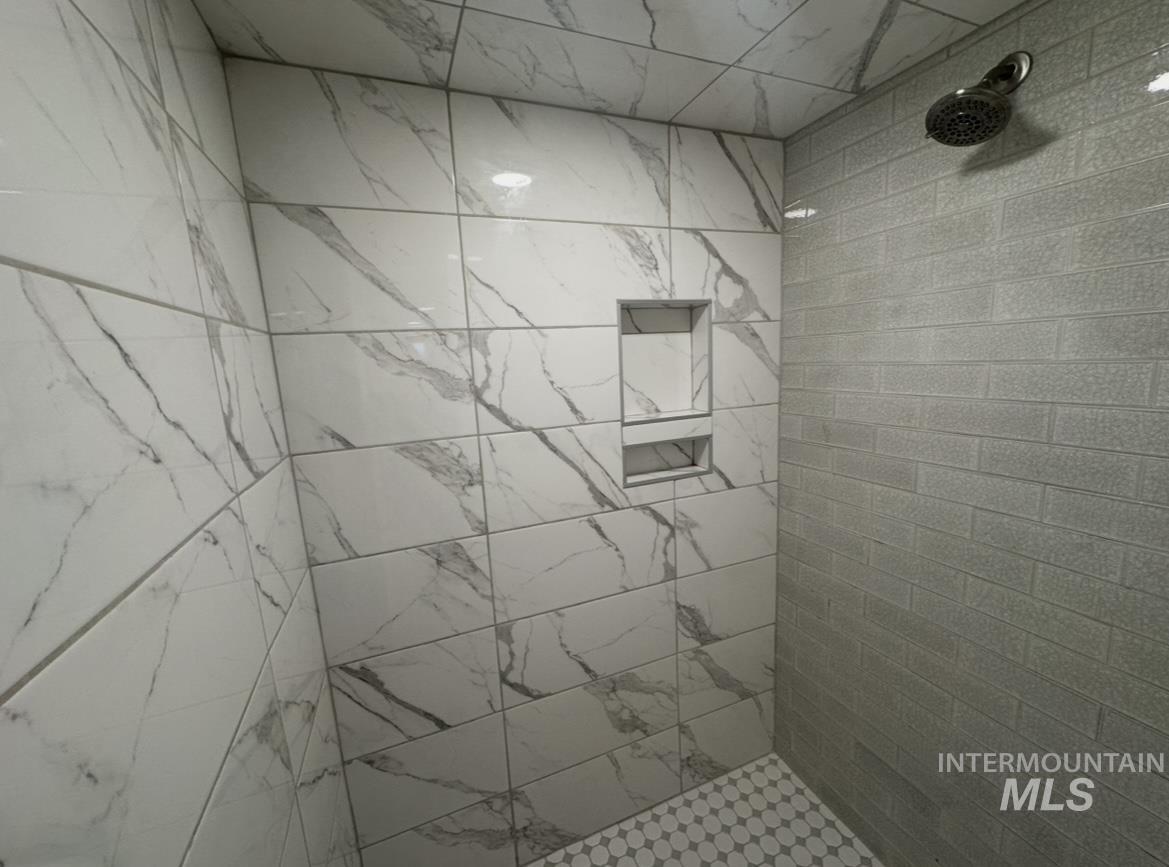 1503 10th Avenue Lewiston, ID 83501 - Photo 36 of 48 Luxury basement bathroom with amazing tile work.