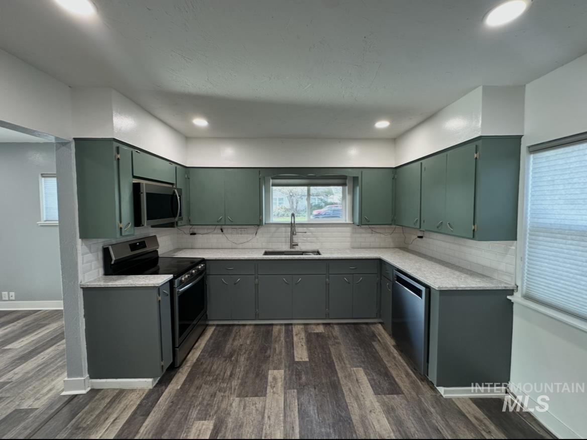 1503 10th Avenue Lewiston, ID 83501 - Photo 10 of 50 Kitchen with new recess lighting and plenty of natural light.