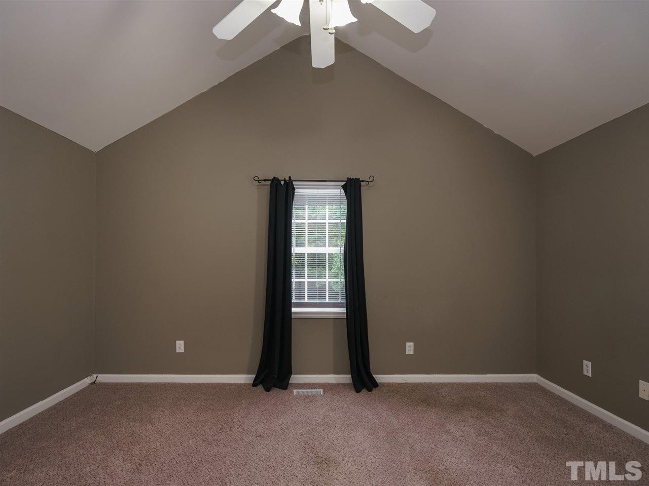 5692 Zacks Mill Road Angier, NC 27501 - Photo 13 of 25 an empty room with windows