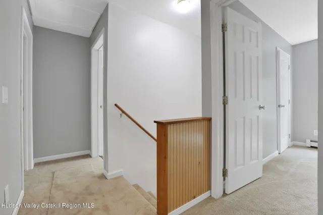 a view of a hallway with closet area