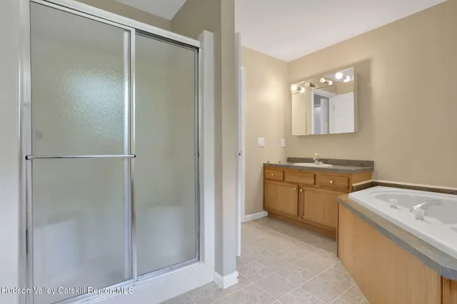 a view of a bathroom with mirror