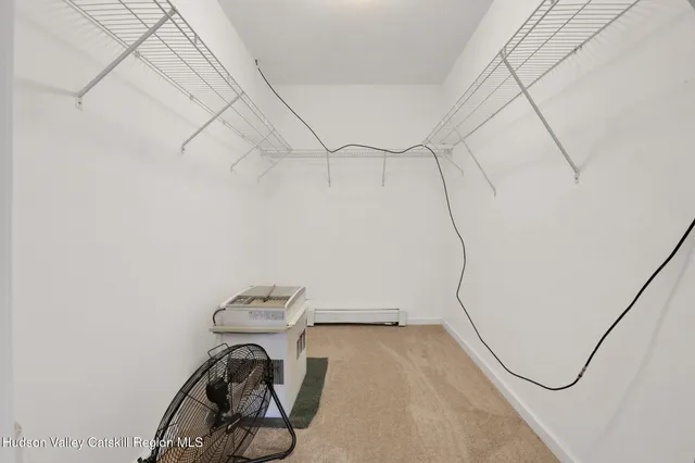 a view of a room with rack on the wall