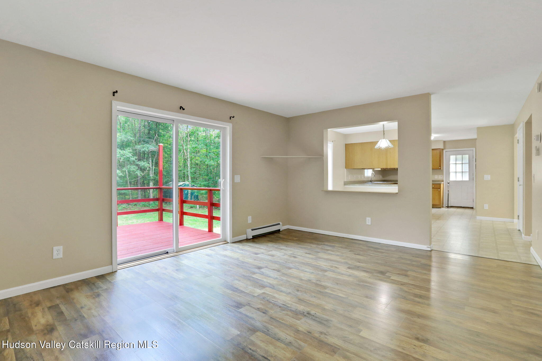10 Lairds Court Purling, NY 12470 - Photo 10 of 25 an empty room with wooden floor and windows