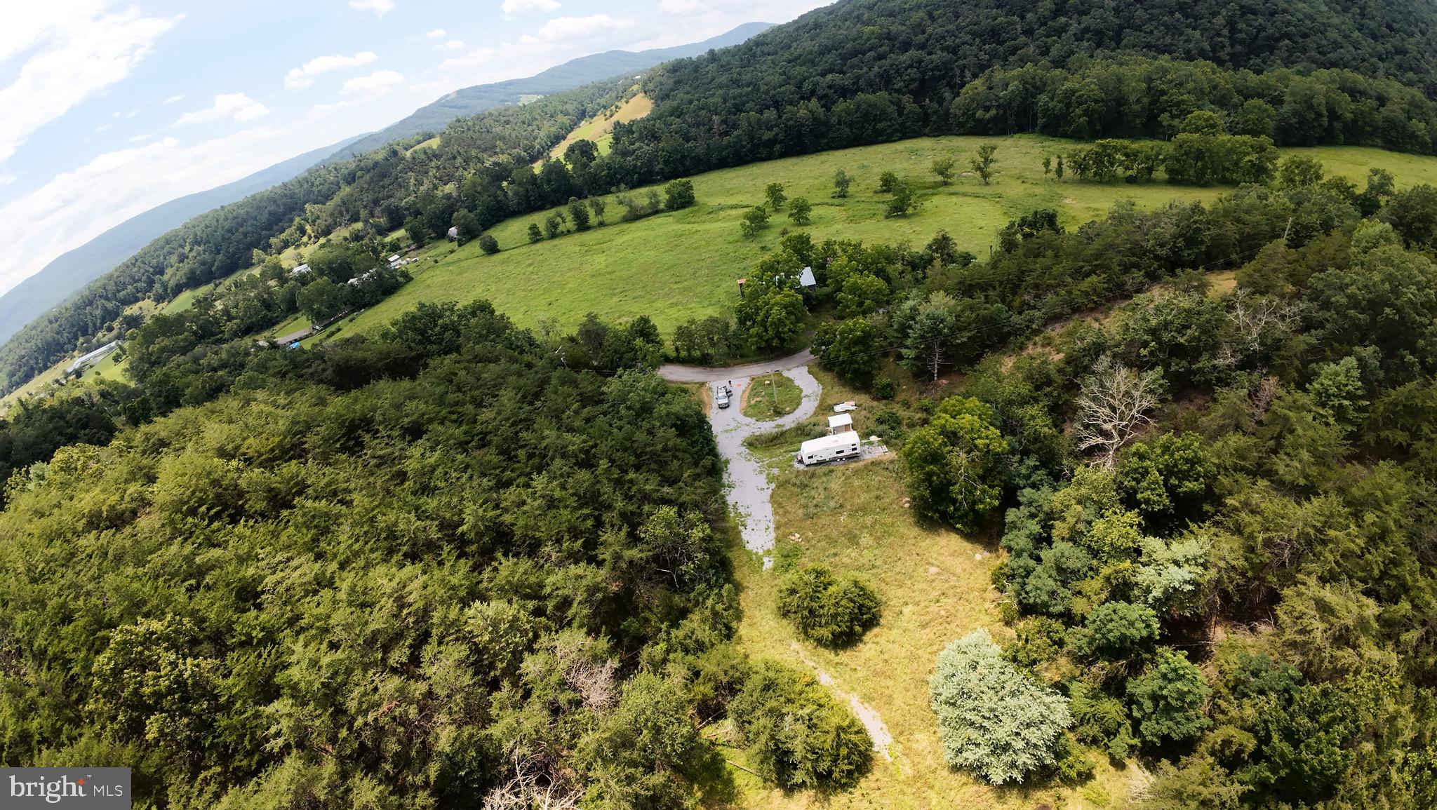 276 Cullers Run Road Mathias, WV 26812 - Photo 3 of 15 an aerial view of residential houses with outdoor space and trees all around