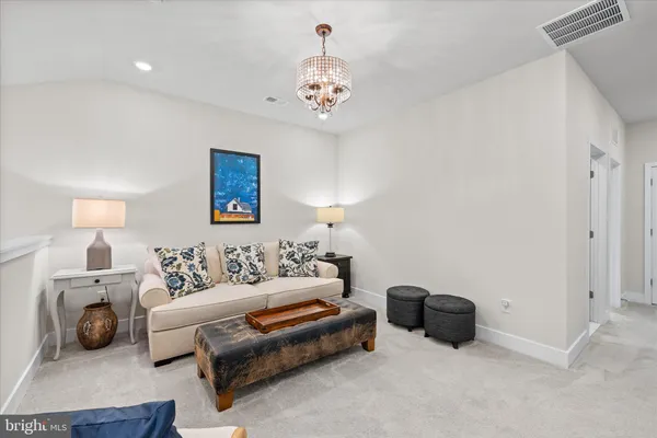 a room with gym equipment and a window