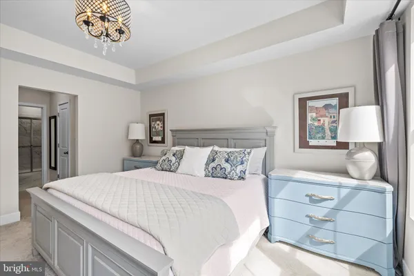 a aerial view of residential houses with outdoor space and trees