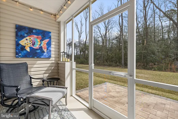 a view of a swimming pool with a yard