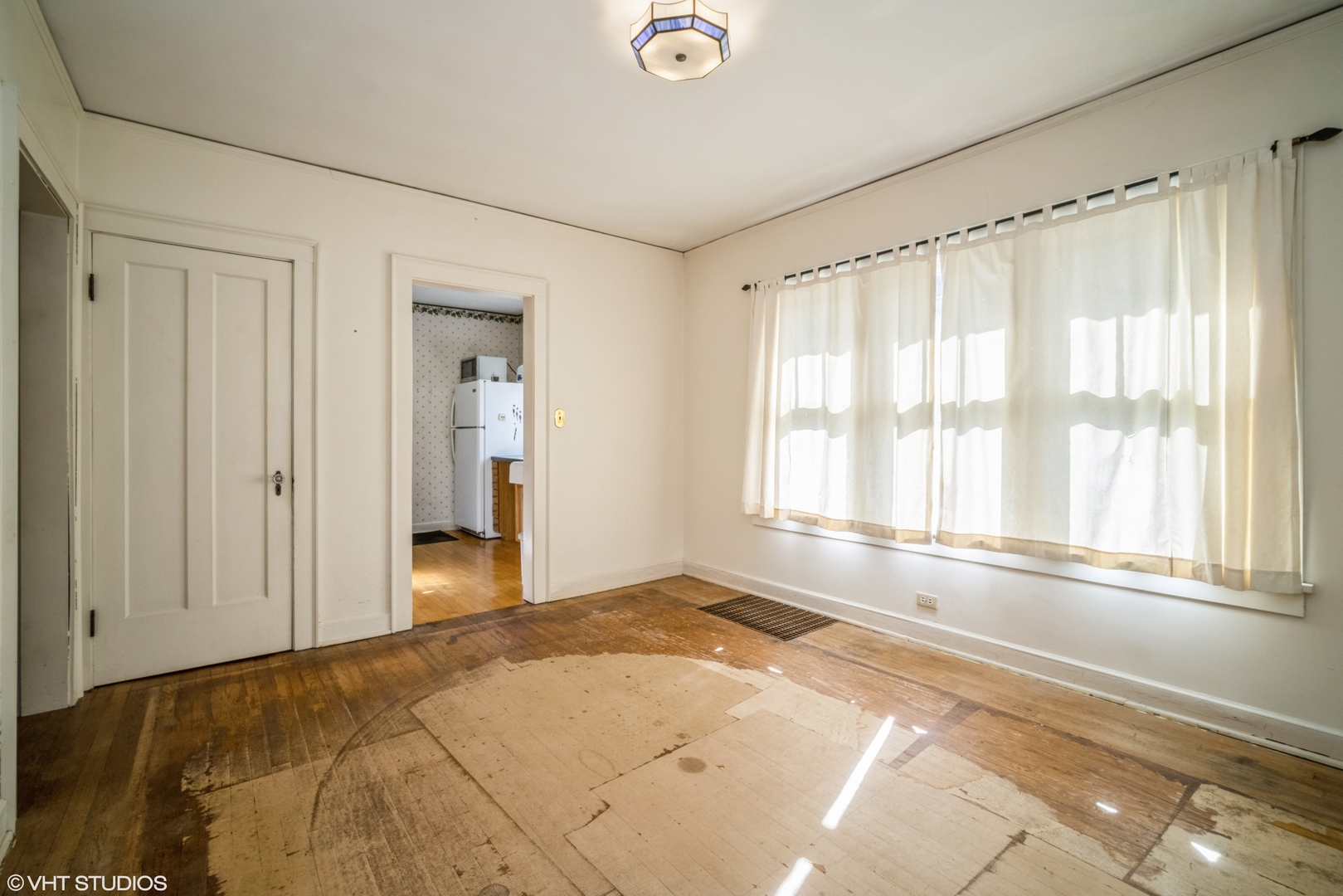 133 South Vail Avenue Arlington Heights, IL 60005 - Photo 7 of 13 a view of empty room with wooden floor and fan