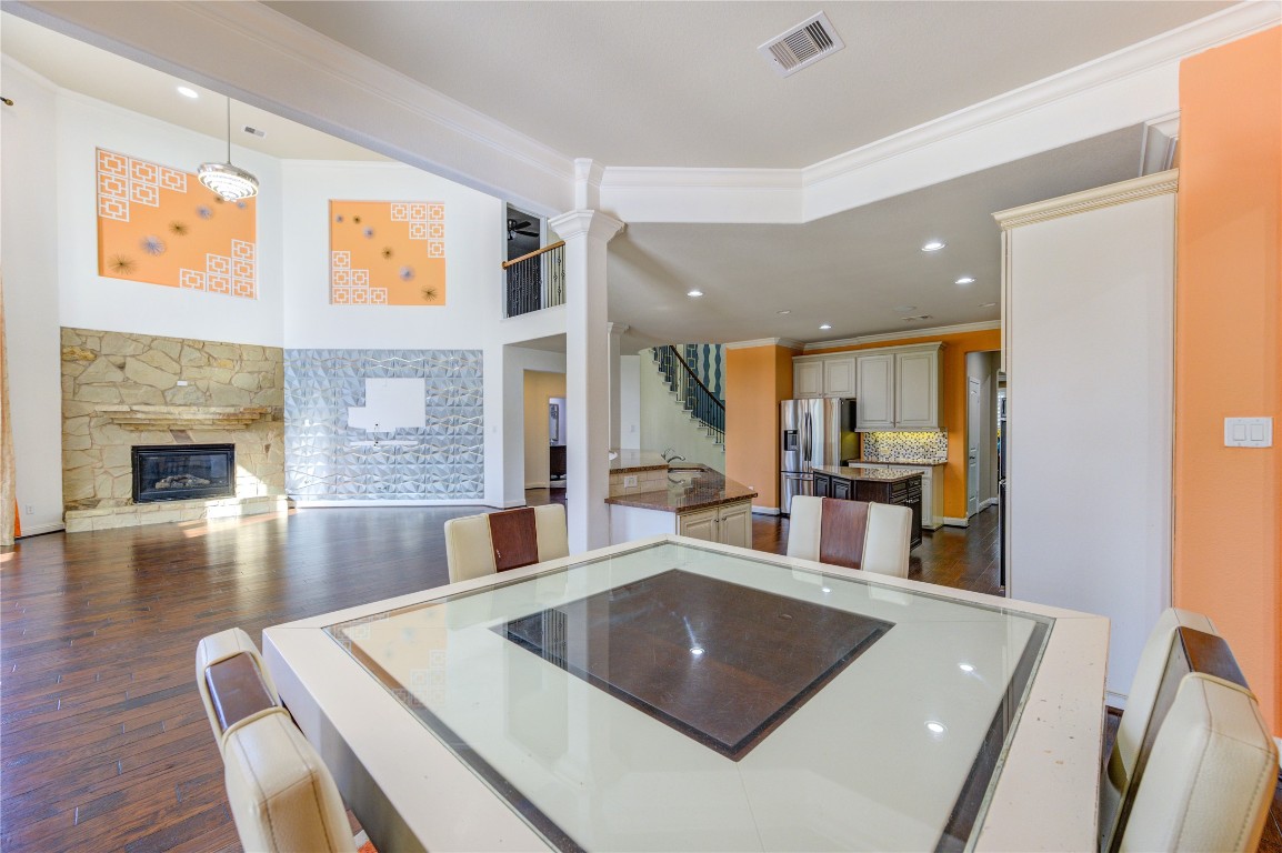 3806 Sims Pointe Court Fulshear, TX 77441 - Photo 19 of 50 a living room with furniture and a wooden floor