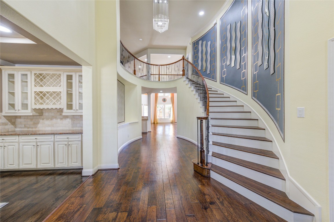 3806 Sims Pointe Court Fulshear, TX 77441 - Photo 2 of 50 a view of entryway and hall with wooden floor