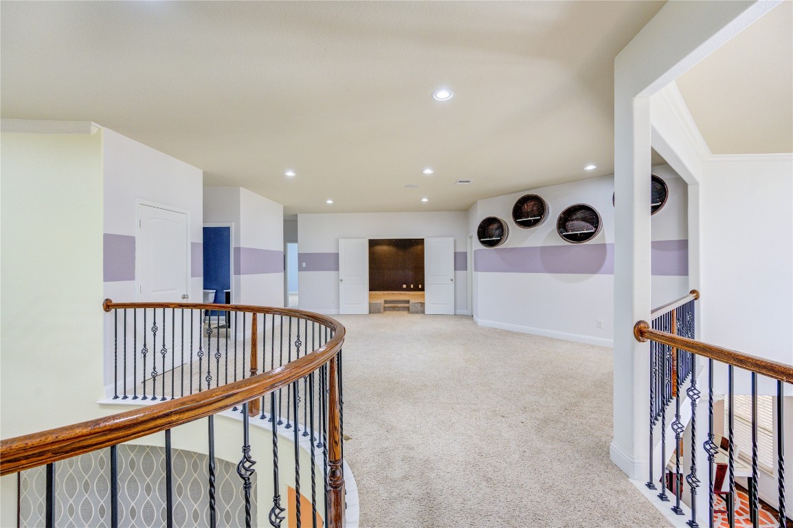 3806 Sims Pointe Court Fulshear, TX 77441 - Photo 29 of 50 a view of hallway with a large window and stairs