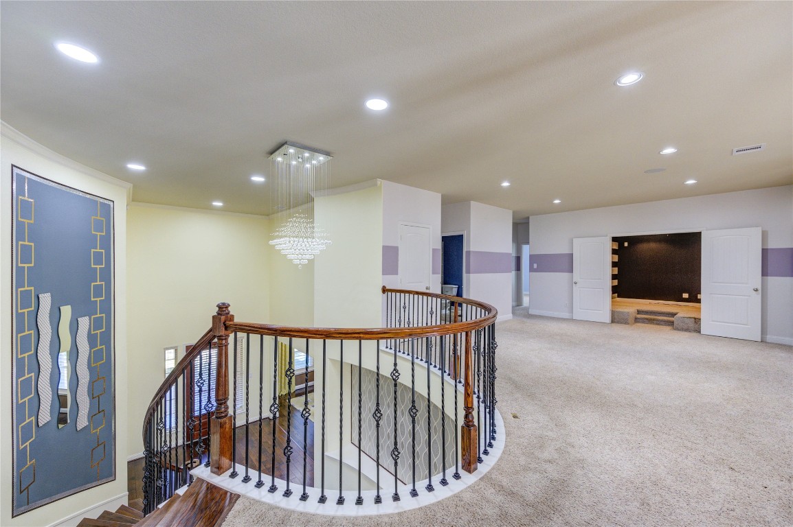 3806 Sims Pointe Court Fulshear, TX 77441 - Photo 30 of 50 a view of a hallway with workspace