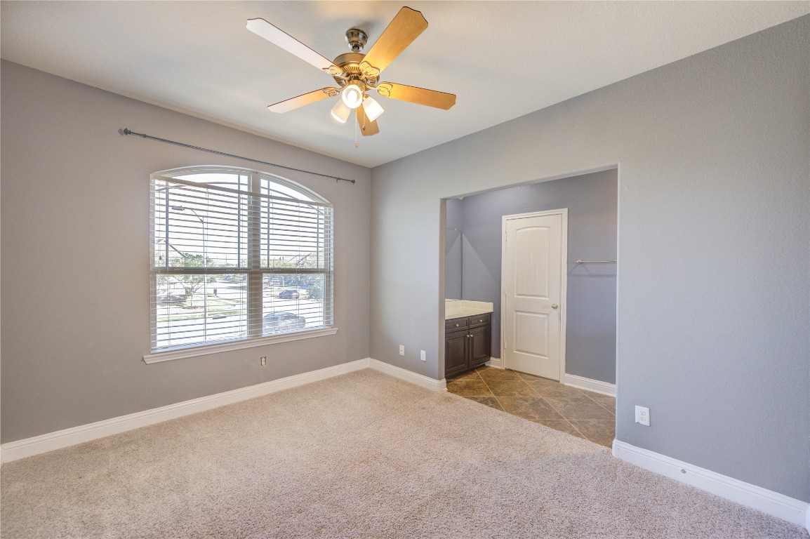 3806 Sims Pointe Court Fulshear, TX 77441 - Photo 35 of 50 a view of an empty room with a window