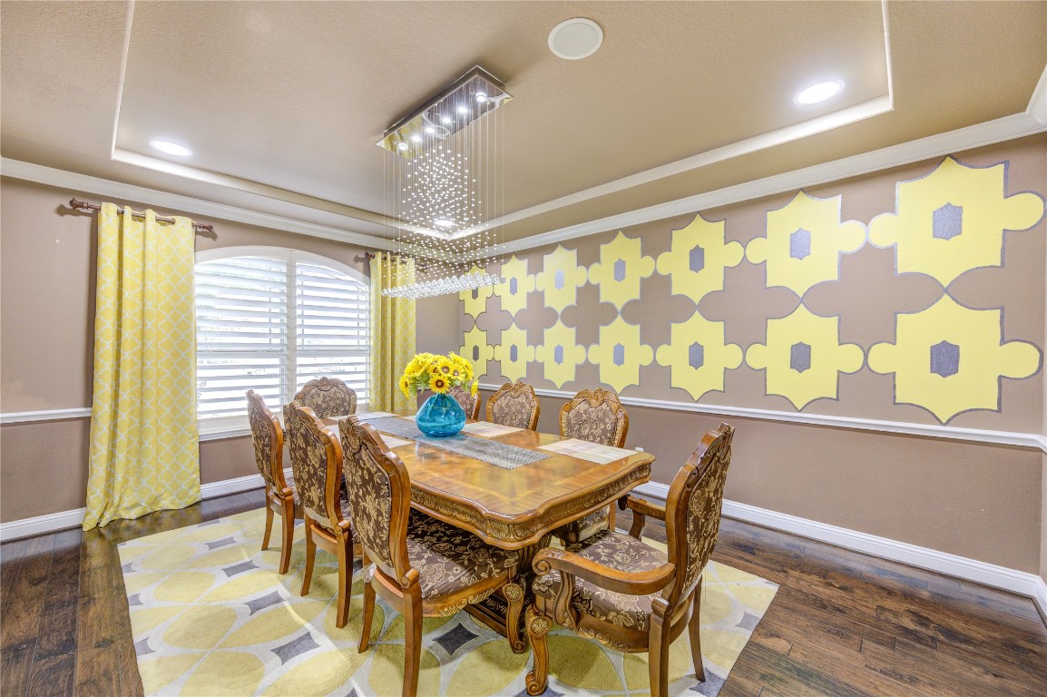 3806 Sims Pointe Court Fulshear, TX 77441 - Photo 4 of 50 a view of a dining room with furniture and a window