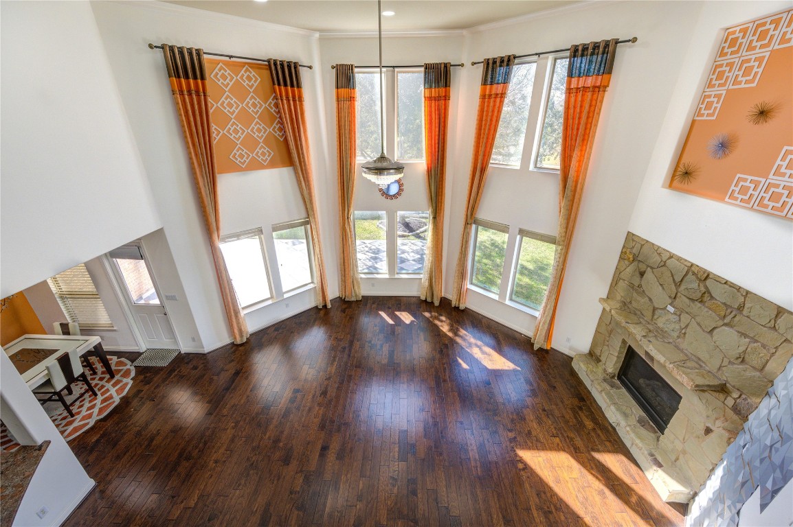 3806 Sims Pointe Court Fulshear, TX 77441 - Photo 42 of 50 a view of a living room with furniture and wooden floor
