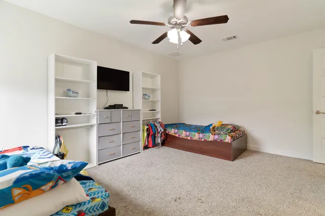 a view of a balcony with wooden floor