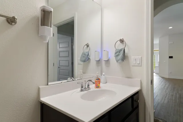 a view of a house with backyard and garden