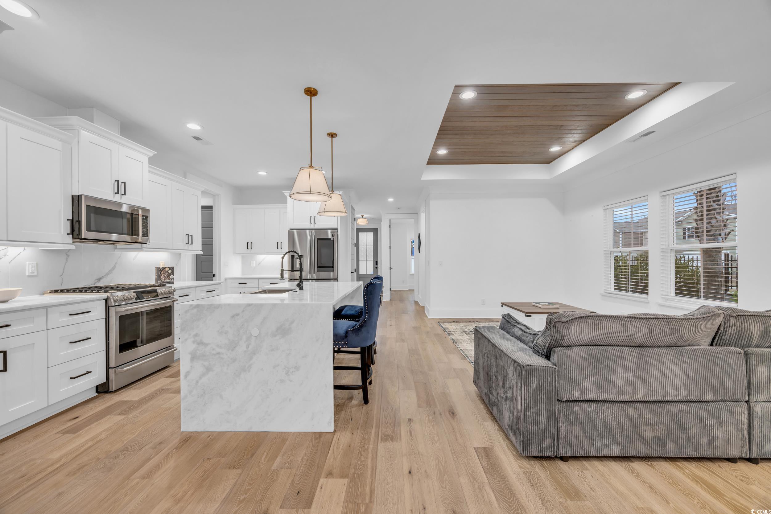 6703 Ocean Breeze Loop Myrtle Beach, SC 29572 - Photo 14 of 40 Kitchen with pendant lighting, stainless steel app