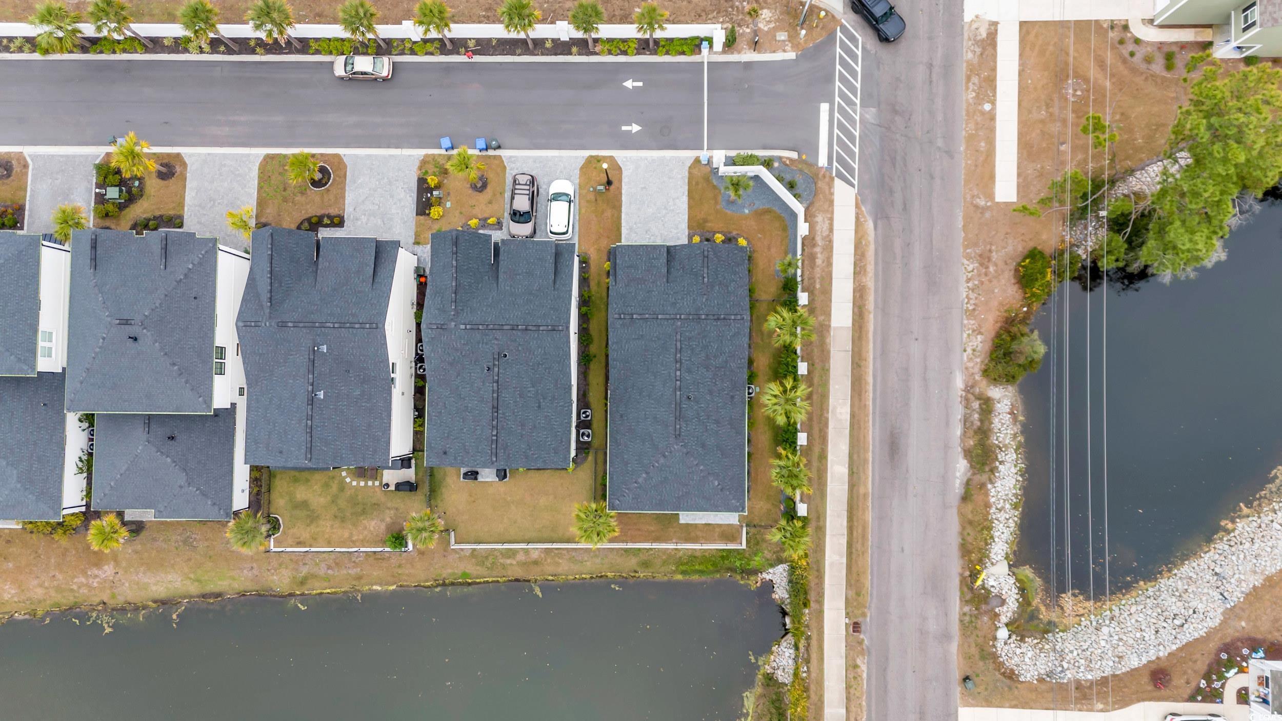 6703 Ocean Breeze Loop Myrtle Beach, SC 29572 - Photo 36 of 40 Birds eye view of property with a water view