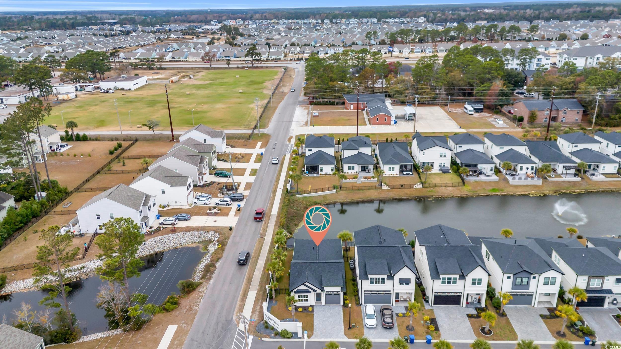 6703 Ocean Breeze Loop Myrtle Beach, SC 29572 - Photo 37 of 40 Drone / aerial view with a water view
