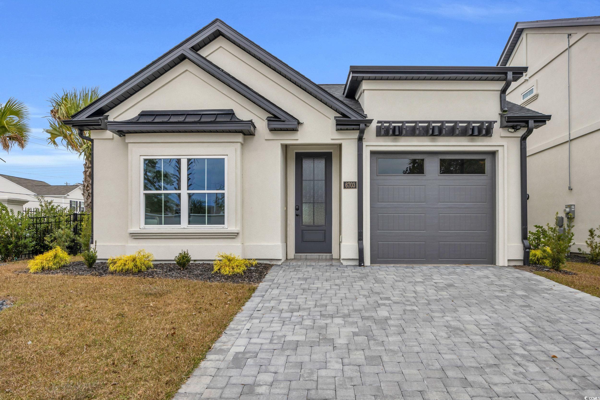 6703 Ocean Breeze Loop Myrtle Beach, SC 29572 - Photo 6 of 40 View of front of property featuring a garage