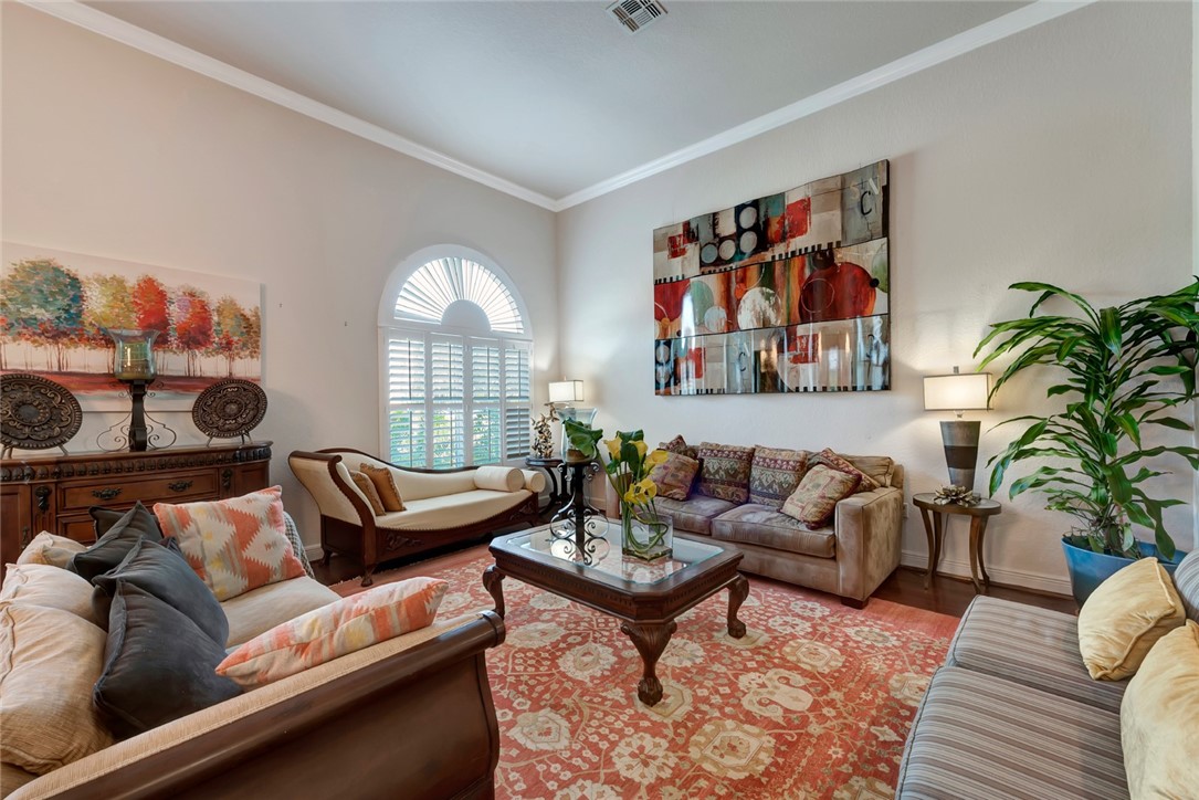 1781 Belmont Circle Southwest Vero Beach, FL 32968 - Photo 7 of 34 a living room with furniture and a large window