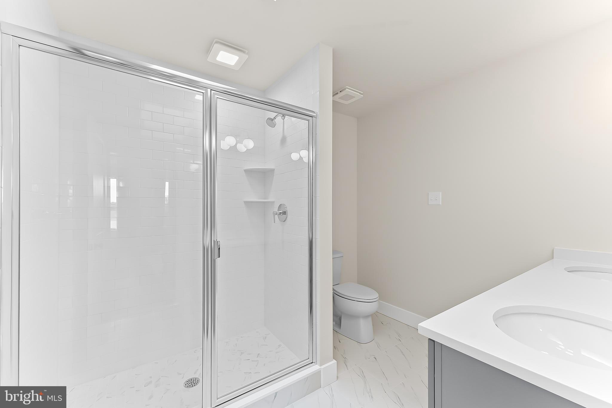 734 South Matlack Street West Chester, PA 19382 - Photo 20 of 22 a bathroom with a shower and a toilet