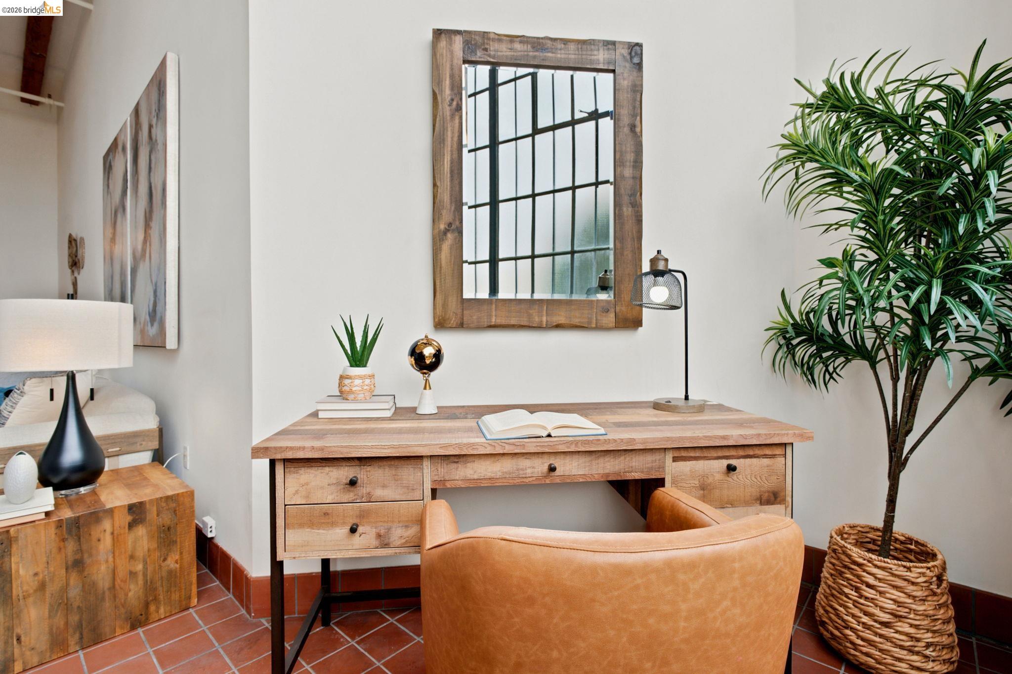1920 Union Street, Unit 9 Oakland, CA 94607 - Photo 7 of 35 Warm-toned terracotta tile flooring complements the light-colored walls