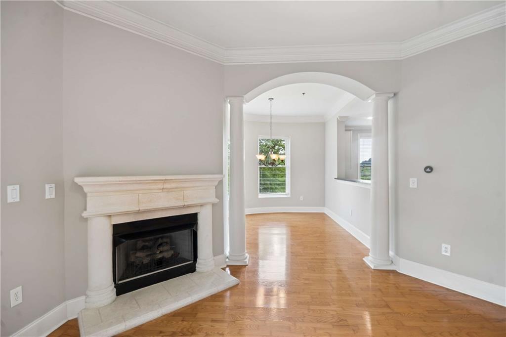 560 Dutch Valley Road Northeast, Unit 311 Atlanta, GA 30324 - Photo 12 of 44 a view of a livingroom with a fireplace and window