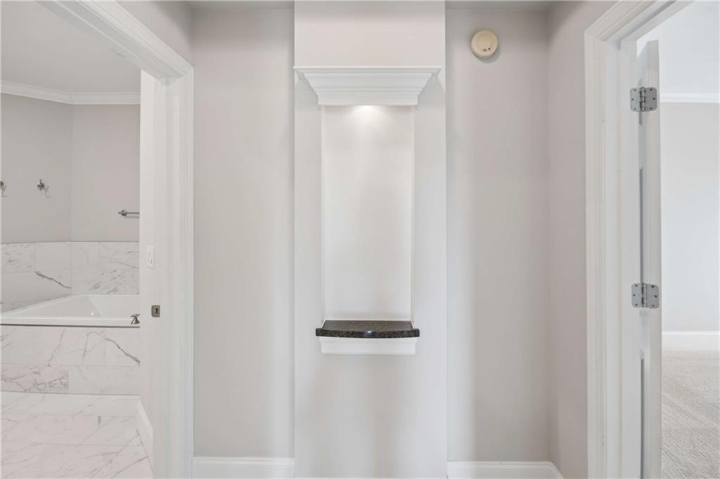 560 Dutch Valley Road Northeast, Unit 311 Atlanta, GA 30324 - Photo 23 of 44 a bathroom with a shower