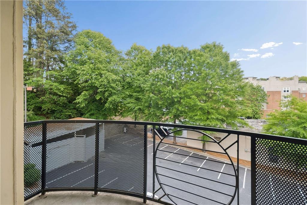 560 Dutch Valley Road Northeast, Unit 311 Atlanta, GA 30324 - Photo 27 of 44 a view of a balcony with an outdoor space