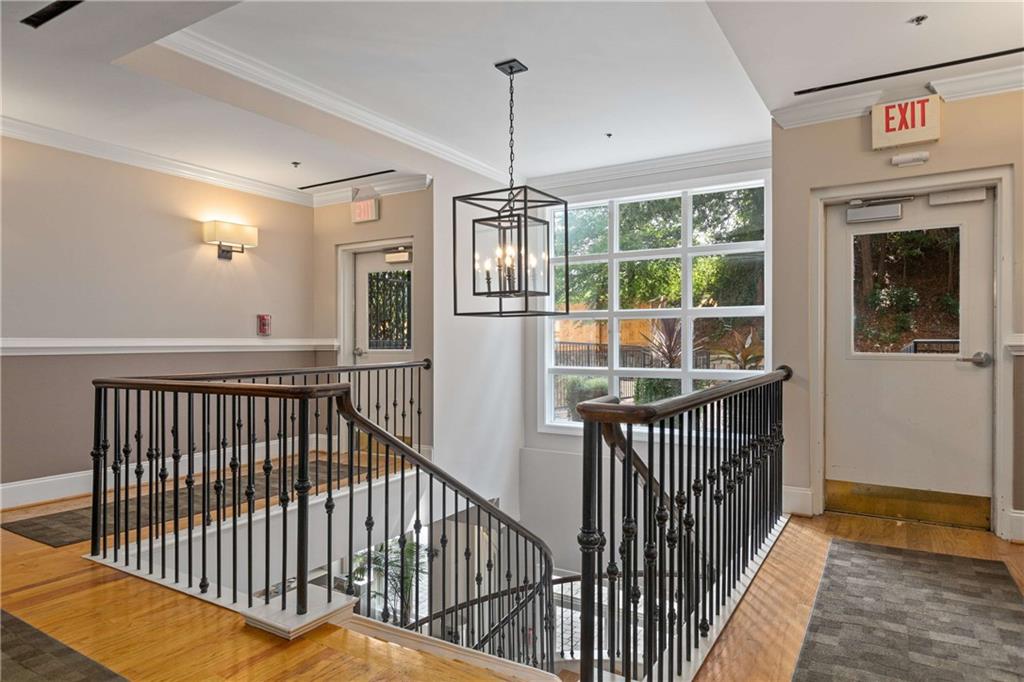 560 Dutch Valley Road Northeast, Unit 311 Atlanta, GA 30324 - Photo 30 of 44 a view of entryway with wooden floor