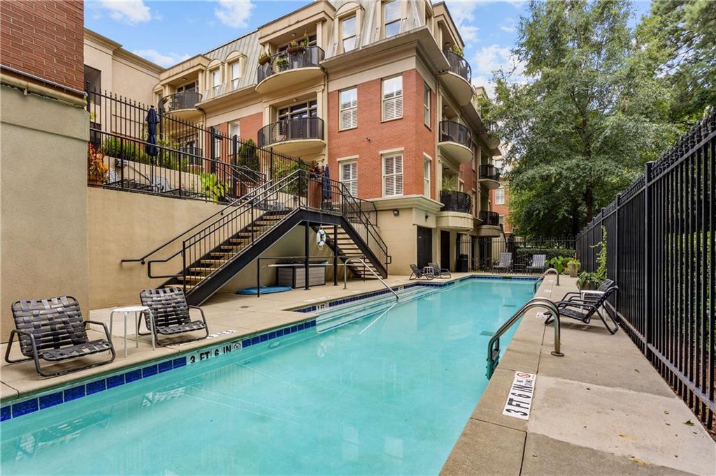 560 Dutch Valley Road Northeast, Unit 311 Atlanta, GA 30324 - Photo 37 of 44 a house view with a outdoor space