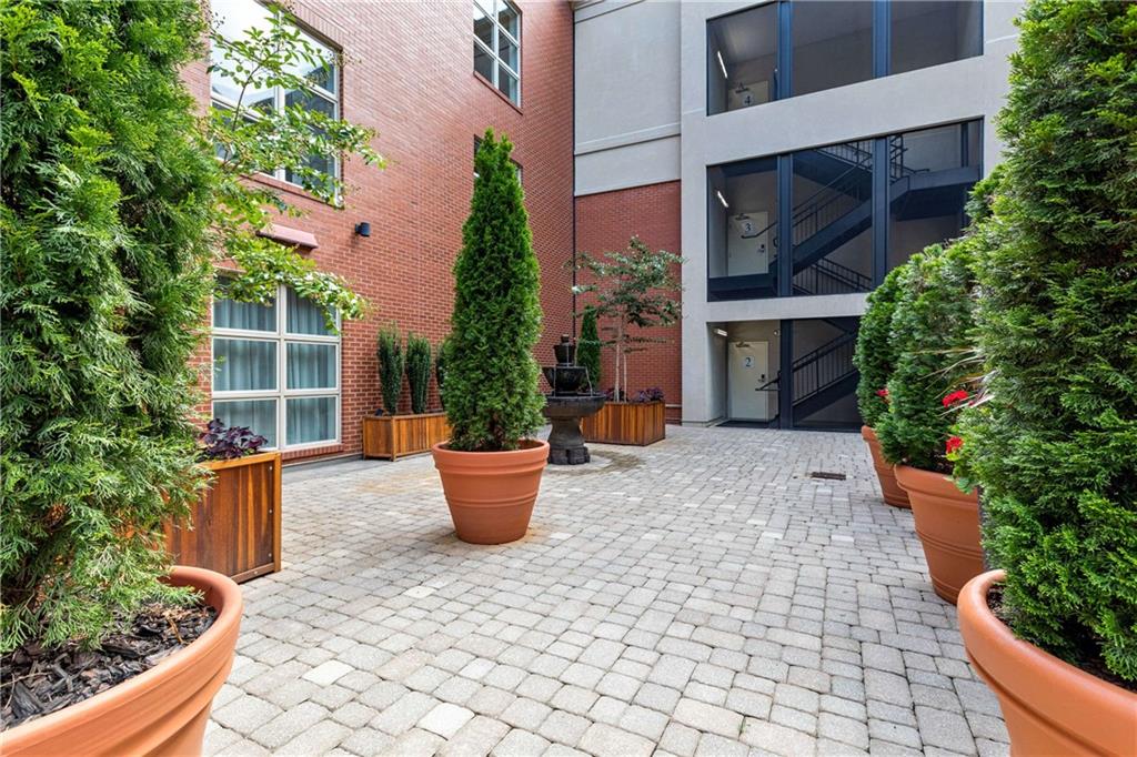 560 Dutch Valley Road Northeast, Unit 311 Atlanta, GA 30324 - Photo 38 of 44 a outdoor view with a seating space