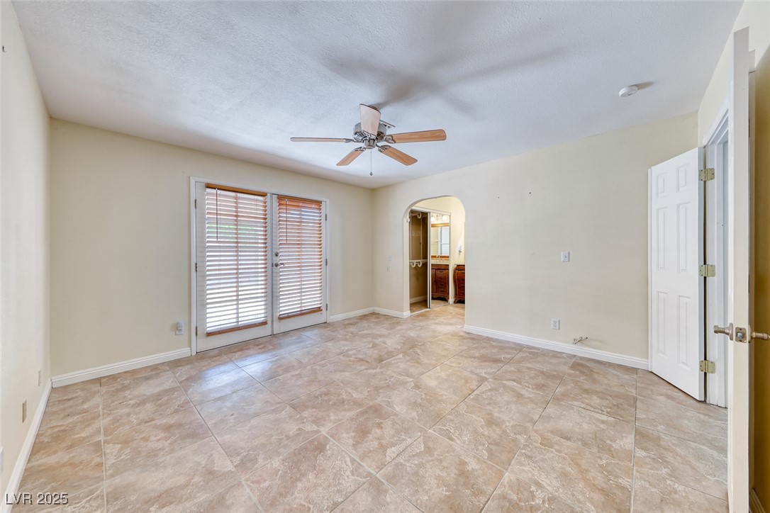 632 Arrayo Way Boulder City, NV 89005 - Photo 24 of 40 Unfurnished room with arched walkways, ceiling fan